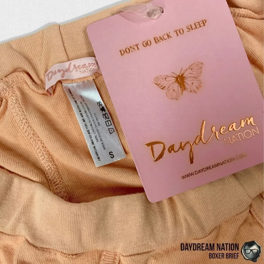 DOLLS KILL DAYDREAM NATION WOMEN’S BOXER BRIEF BOY SHORTS IN CORAL PINK SMALL